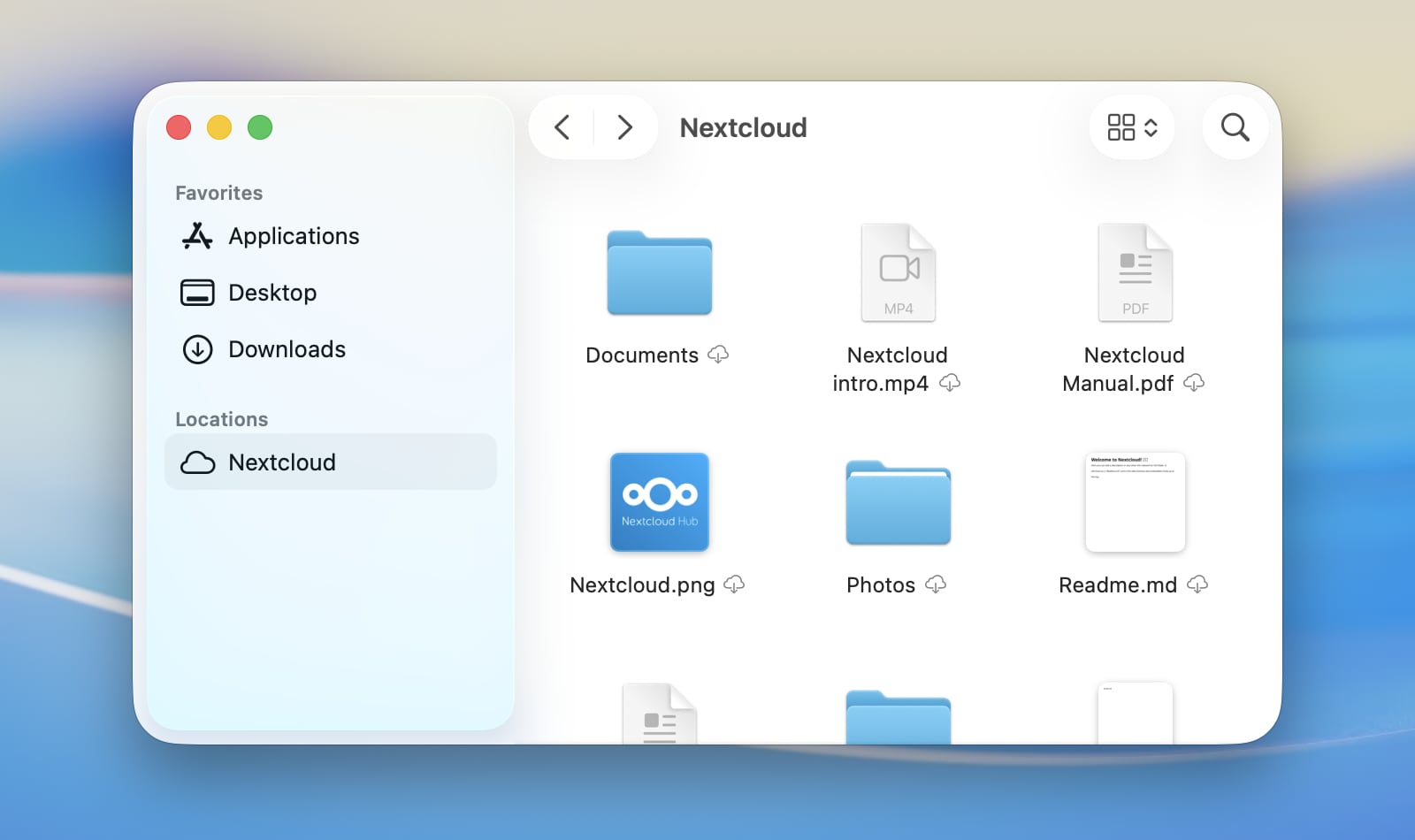 Finder sidebar showing a Nextcloud File Provider domain